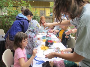 Kids and their parents alike enjoyed making dream weavers, facilitated by artist David Francis.